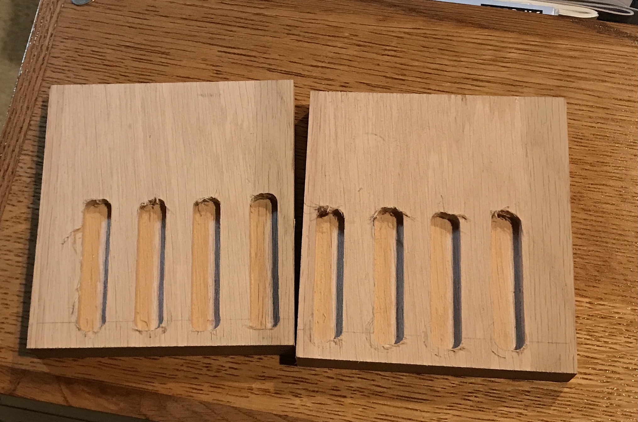 The top and bottom of box with punch slots cut